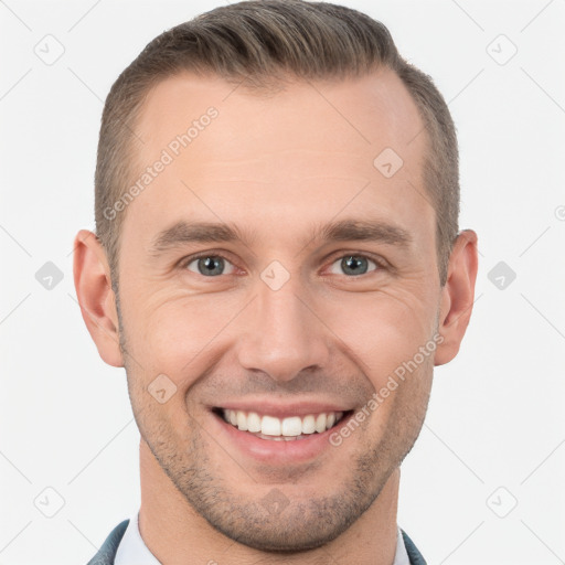 Joyful white young-adult male with short  brown hair and brown eyes