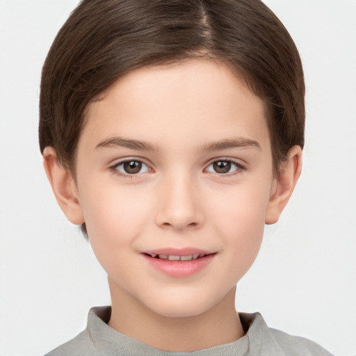 Joyful white child female with short  brown hair and brown eyes