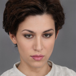 Neutral white young-adult female with short  brown hair and brown eyes