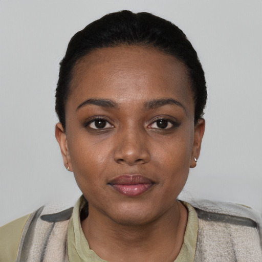 Neutral black young-adult female with short  black hair and brown eyes