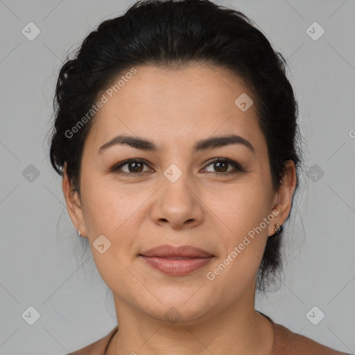 Joyful latino young-adult female with medium  brown hair and brown eyes