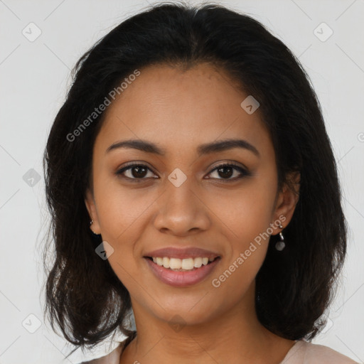 Joyful latino young-adult female with medium  brown hair and brown eyes