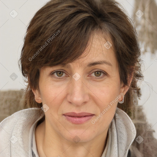 Joyful white adult female with long  brown hair and brown eyes