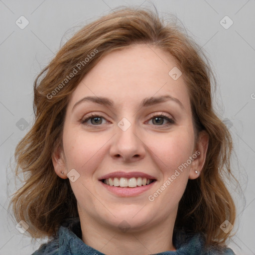 Joyful white young-adult female with medium  brown hair and blue eyes