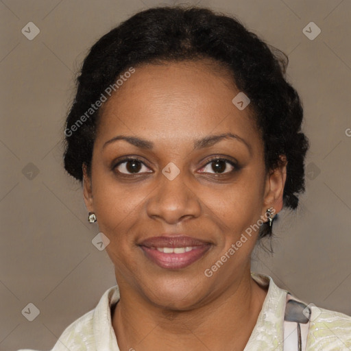 Joyful black adult female with short  brown hair and brown eyes