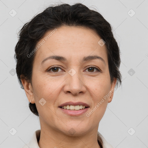 Joyful white adult female with short  brown hair and brown eyes