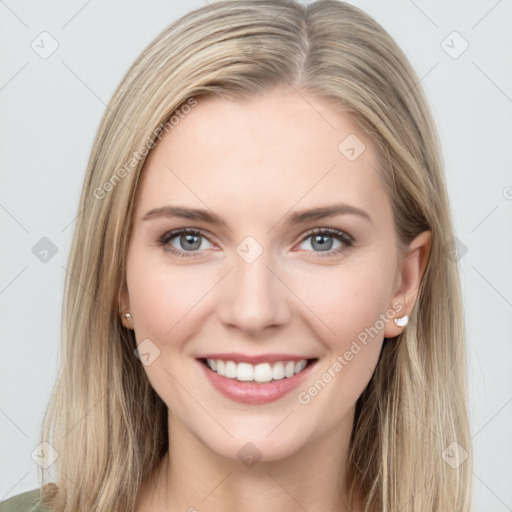 Joyful white young-adult female with long  brown hair and grey eyes