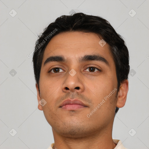 Neutral latino young-adult male with short  black hair and brown eyes