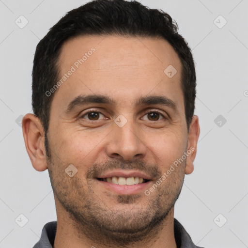 Joyful white young-adult male with short  brown hair and brown eyes