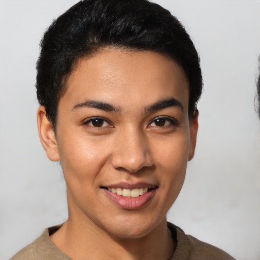 Joyful latino young-adult female with short  brown hair and brown eyes