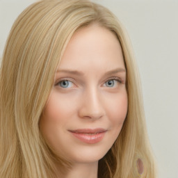 Joyful white young-adult female with long  brown hair and blue eyes