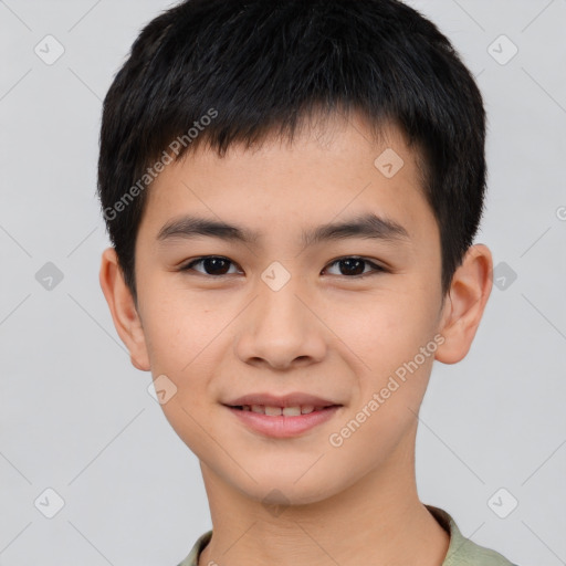 Joyful white child male with short  brown hair and brown eyes