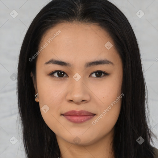 Joyful asian young-adult female with long  brown hair and brown eyes