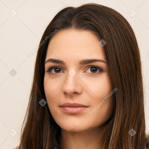 Neutral white young-adult female with long  brown hair and brown eyes