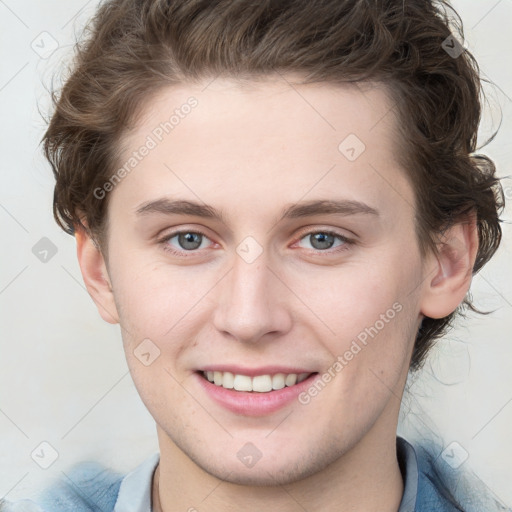 Joyful white young-adult female with short  brown hair and blue eyes