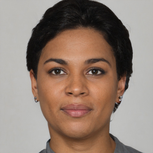 Neutral black young-adult female with short  black hair and brown eyes