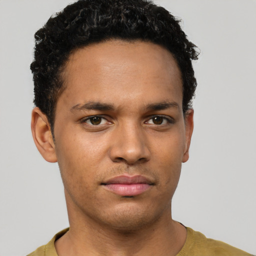 Neutral latino young-adult male with short  brown hair and brown eyes