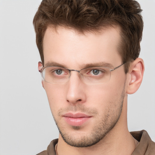 Neutral white young-adult male with short  brown hair and grey eyes