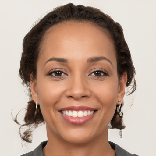 Joyful white young-adult female with medium  brown hair and brown eyes