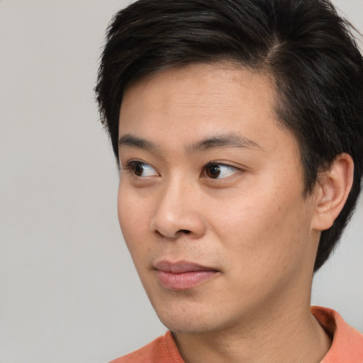 Neutral asian young-adult male with short  brown hair and brown eyes