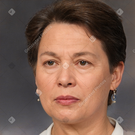 Joyful white adult female with short  brown hair and brown eyes