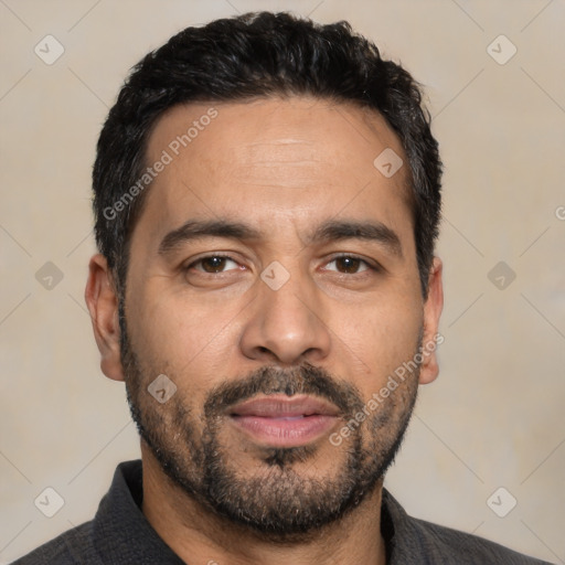 Neutral latino young-adult male with short  black hair and brown eyes