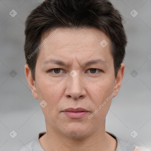 Joyful white adult female with short  brown hair and brown eyes