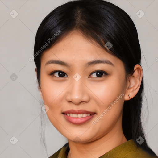 Joyful asian young-adult female with medium  brown hair and brown eyes