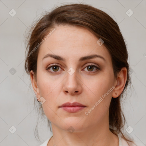 Neutral white young-adult female with medium  brown hair and brown eyes