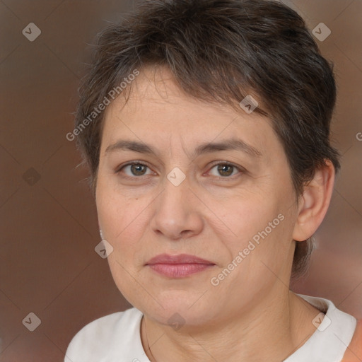 Joyful white adult female with short  brown hair and brown eyes