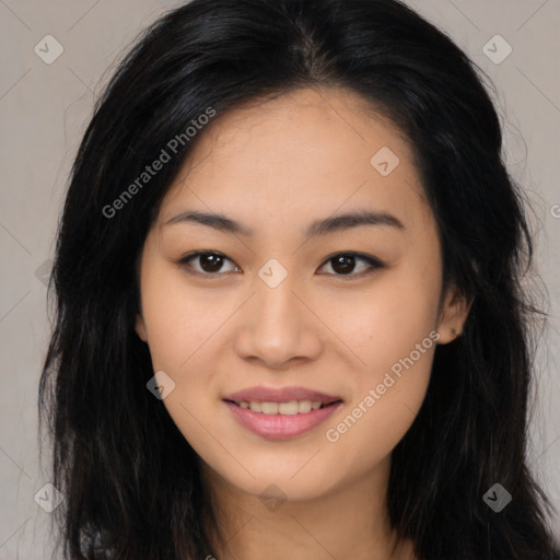 Joyful asian young-adult female with long  brown hair and brown eyes