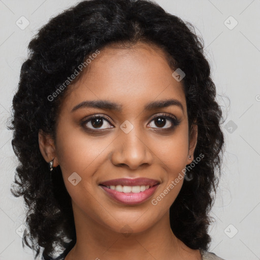 Joyful black young-adult female with long  brown hair and brown eyes