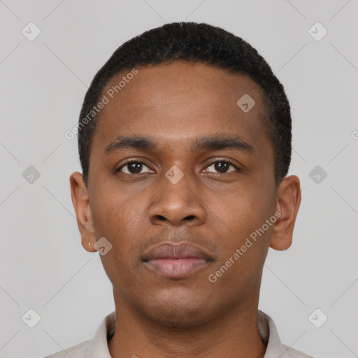 Neutral black young-adult male with short  brown hair and brown eyes