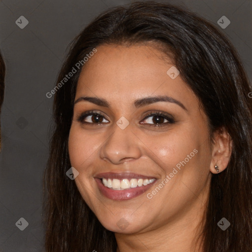 Joyful white young-adult female with long  brown hair and brown eyes