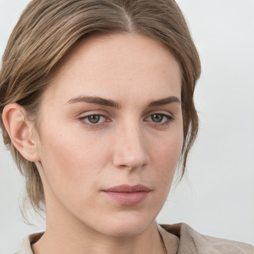 Neutral white young-adult female with medium  brown hair and grey eyes