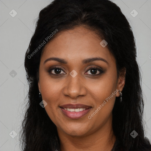 Joyful black young-adult female with long  brown hair and brown eyes