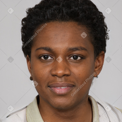 Joyful black young-adult female with short  black hair and brown eyes