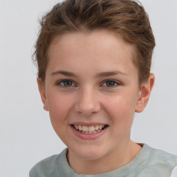 Joyful white child female with short  brown hair and grey eyes