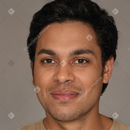 Joyful latino young-adult male with short  brown hair and brown eyes