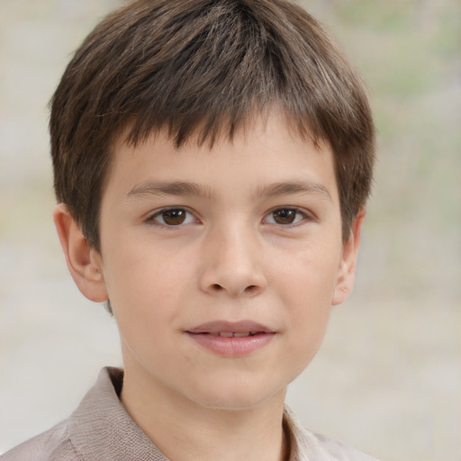 Joyful white child male with short  brown hair and brown eyes