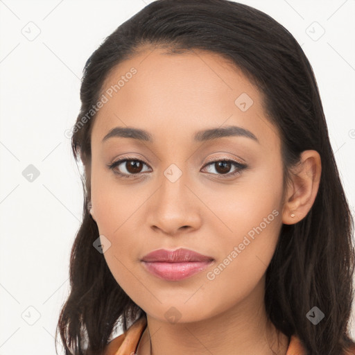 Joyful latino young-adult female with long  brown hair and brown eyes