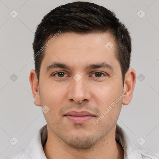 Joyful white young-adult male with short  brown hair and brown eyes