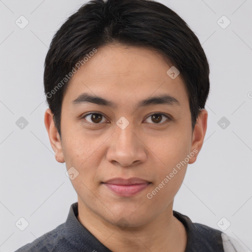 Joyful asian young-adult male with short  brown hair and brown eyes