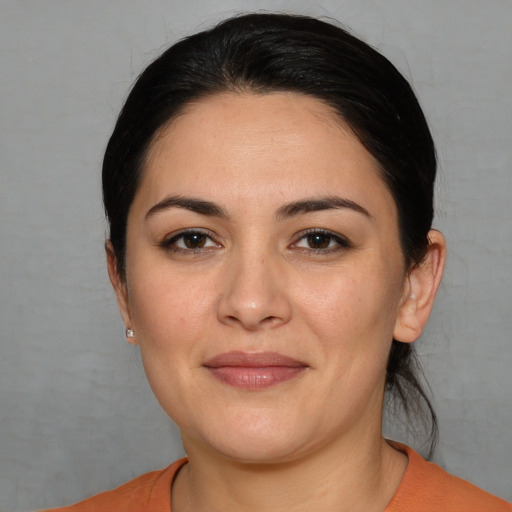 Joyful white young-adult female with medium  brown hair and brown eyes