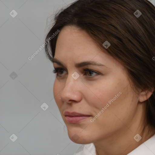 Neutral white young-adult female with short  brown hair and brown eyes