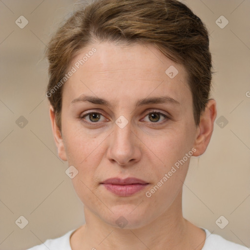 Joyful white adult female with short  brown hair and brown eyes