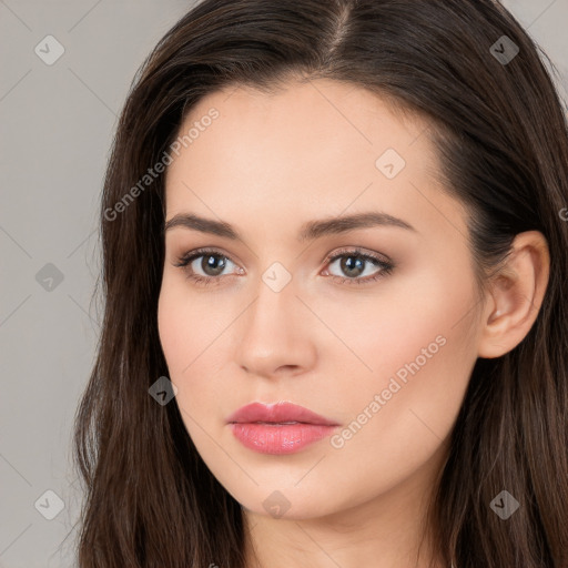 Neutral white young-adult female with long  brown hair and brown eyes