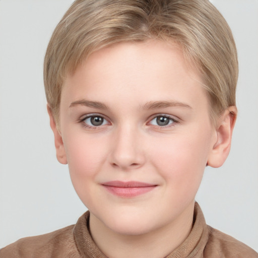 Joyful white child female with short  brown hair and grey eyes