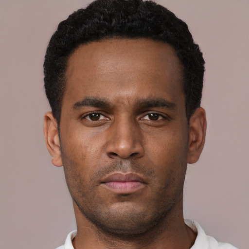Neutral black young-adult male with short  black hair and brown eyes