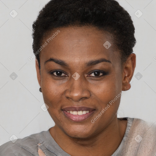 Joyful black young-adult female with short  black hair and brown eyes